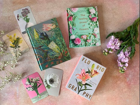 floral books spread out on a background